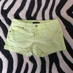 Bright yellow whitewashed jean shorts
